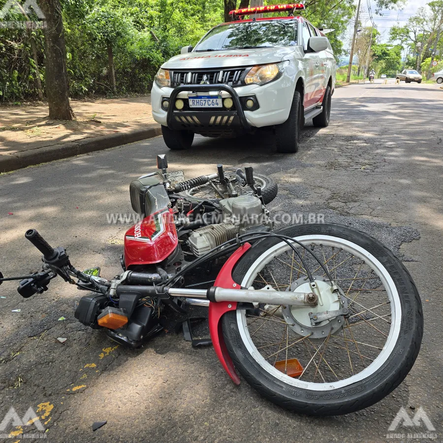 Motociclista escapa da morte após cair debaixo dos rodados de caminhão